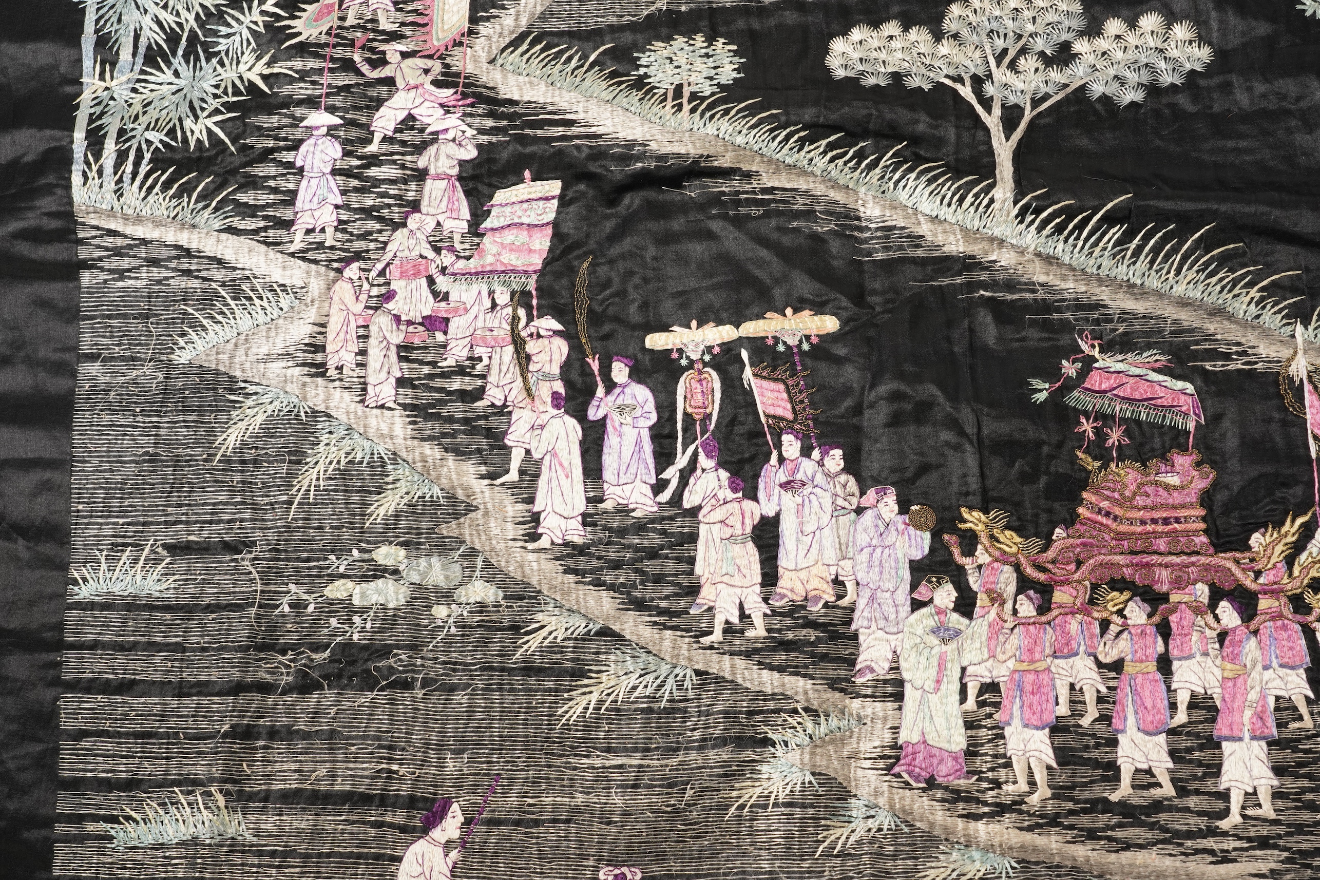 Four Chinese embroidered silk panels, late 19th/early 20th century and a similar Indian panel